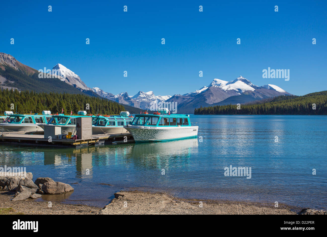 Tour boat on Maligne Lake In Jasper National Park in Alberta Canada Stock Photo