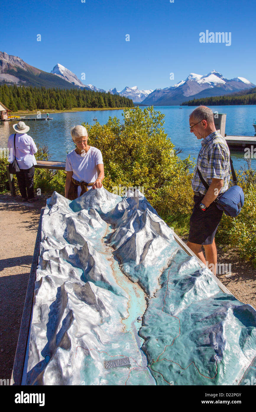 People looking at relief map of In Jasper National Park in Alberta Canada Stock Photo