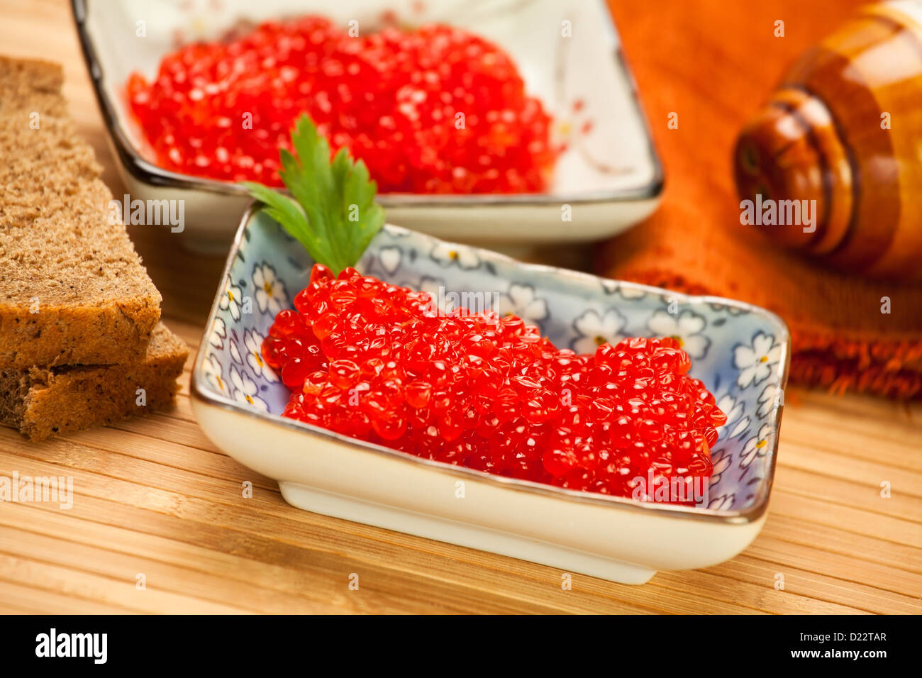caviar red bowls two bread napkin Stock Photo