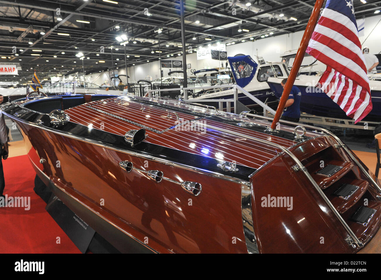 Excel, London, UK. 12th January 2013. A 1930s style wooden speedboat