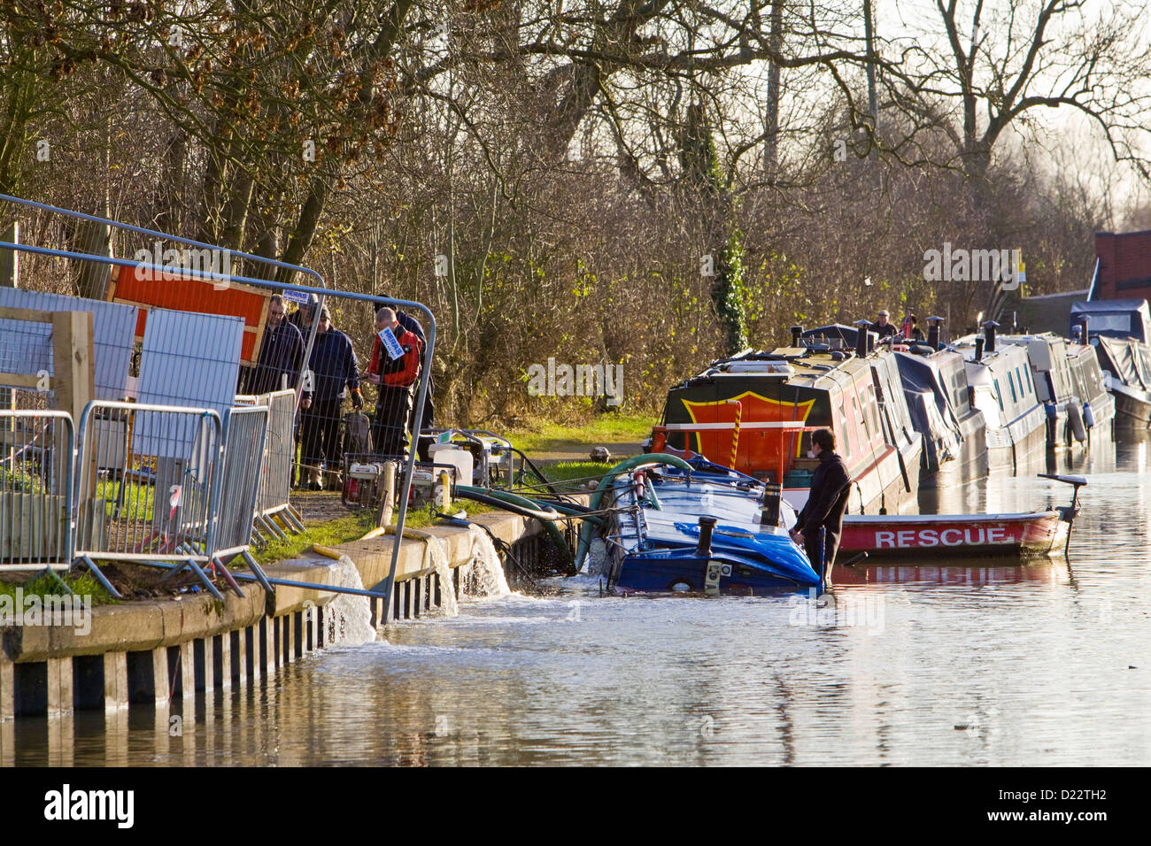 A flooded sunken canal boat in the recent floods Stock Photo