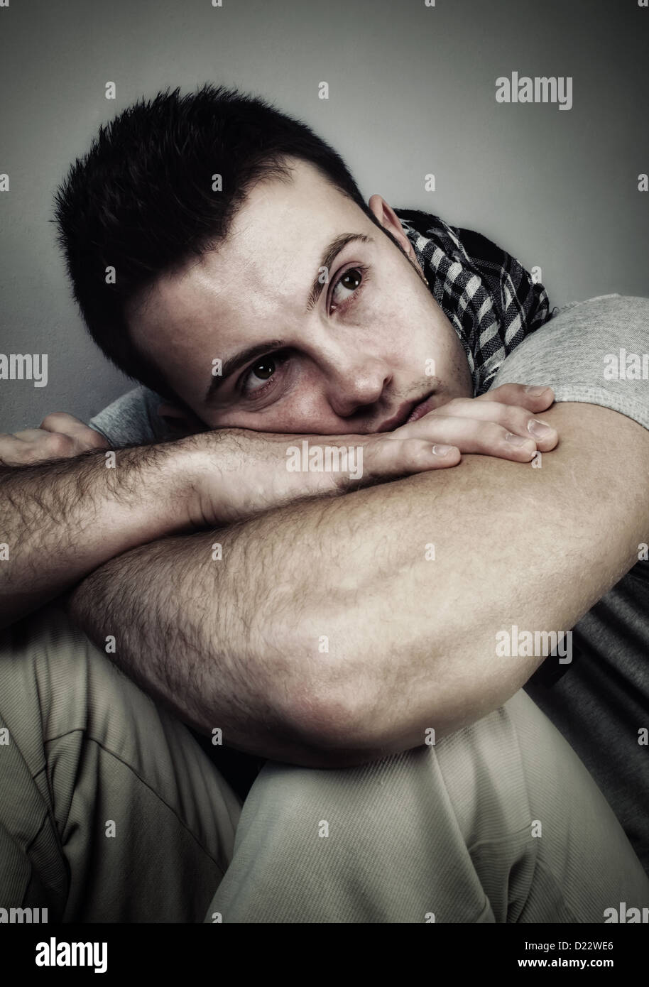 Young man who is lonely and desolate-High contrast image Stock Photo