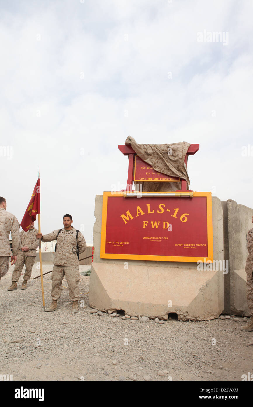 U.S. Marines and Sailors with Marine Aviation Logistics Squadron (MALS) 16, Marine Aircraft Group 16, 3rd Marine Aircraft Wing (Forward), unveil a sign during a dedication at Camp Bastion, Helmand province, Afghanistan, Jan. 10, 2103. MALS-16 dedicated th Stock Photo