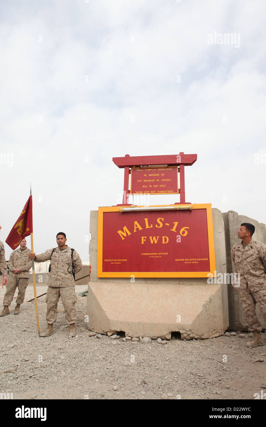 U.S. Marines and Sailors with Marine Aviation Logistics Squadron (MALS) 16, Marine Aircraft Group 16, 3rd Marine Aircraft Wing (Forward), unveil a sign during a dedication at Camp Bastion, Helmand province, Afghanistan, Jan. 10, 2103. MALS-16 dedicated th Stock Photo