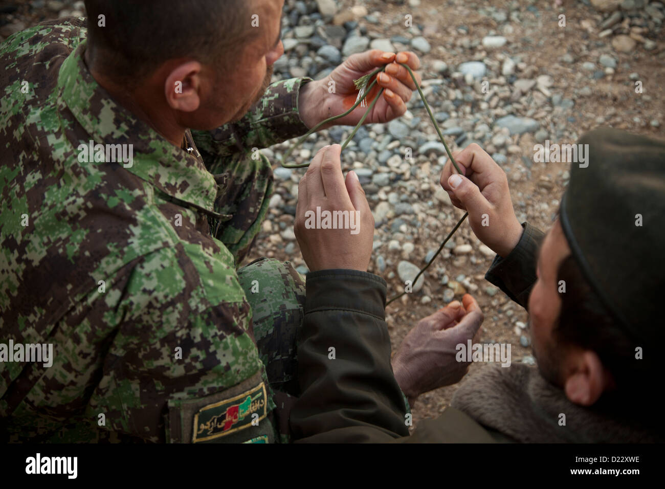Afghan National Army soldiers prepare rope during counter improvised ...