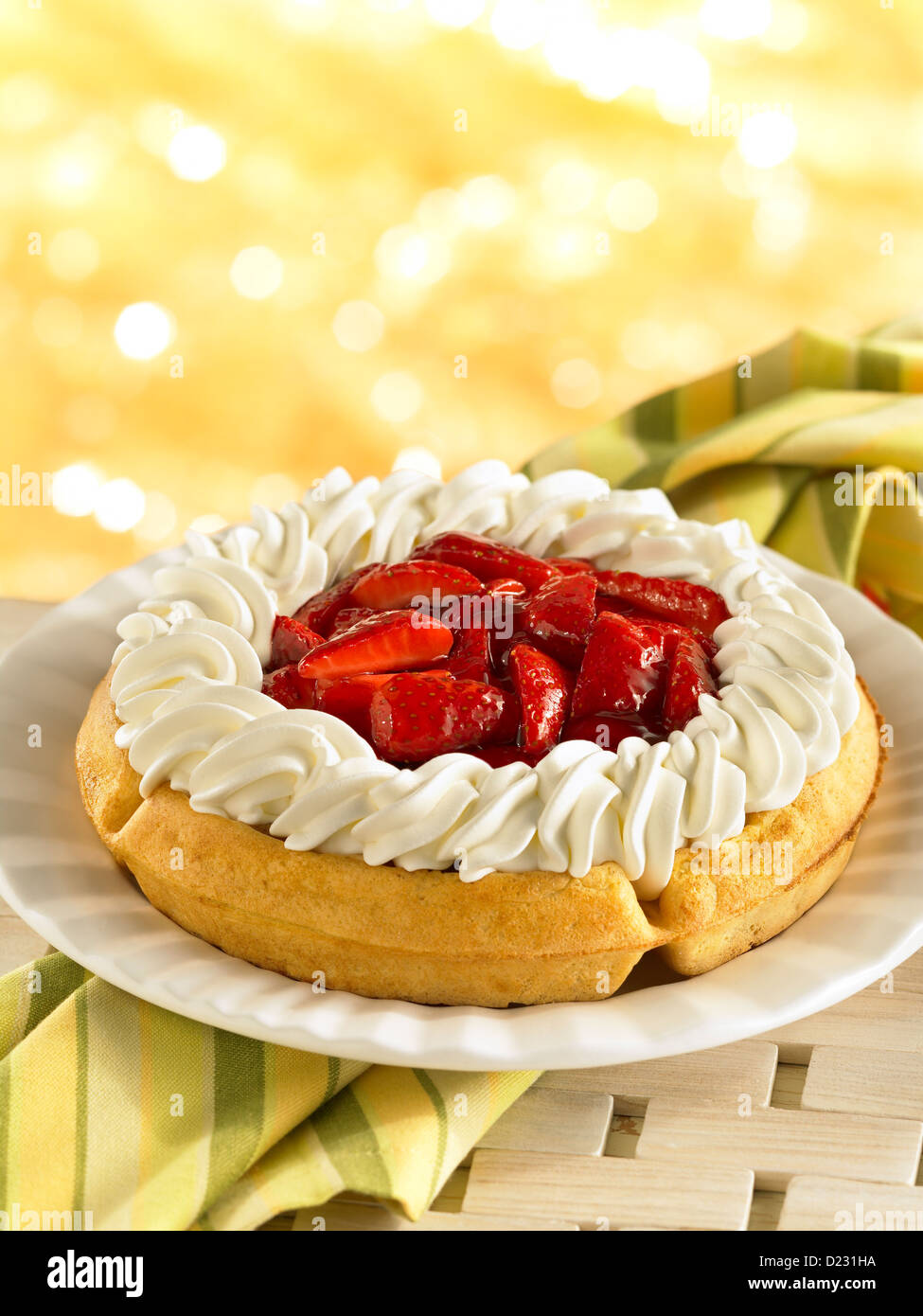 Strawberry waffle breakfast with whipped cream Stock Photo - Alamy