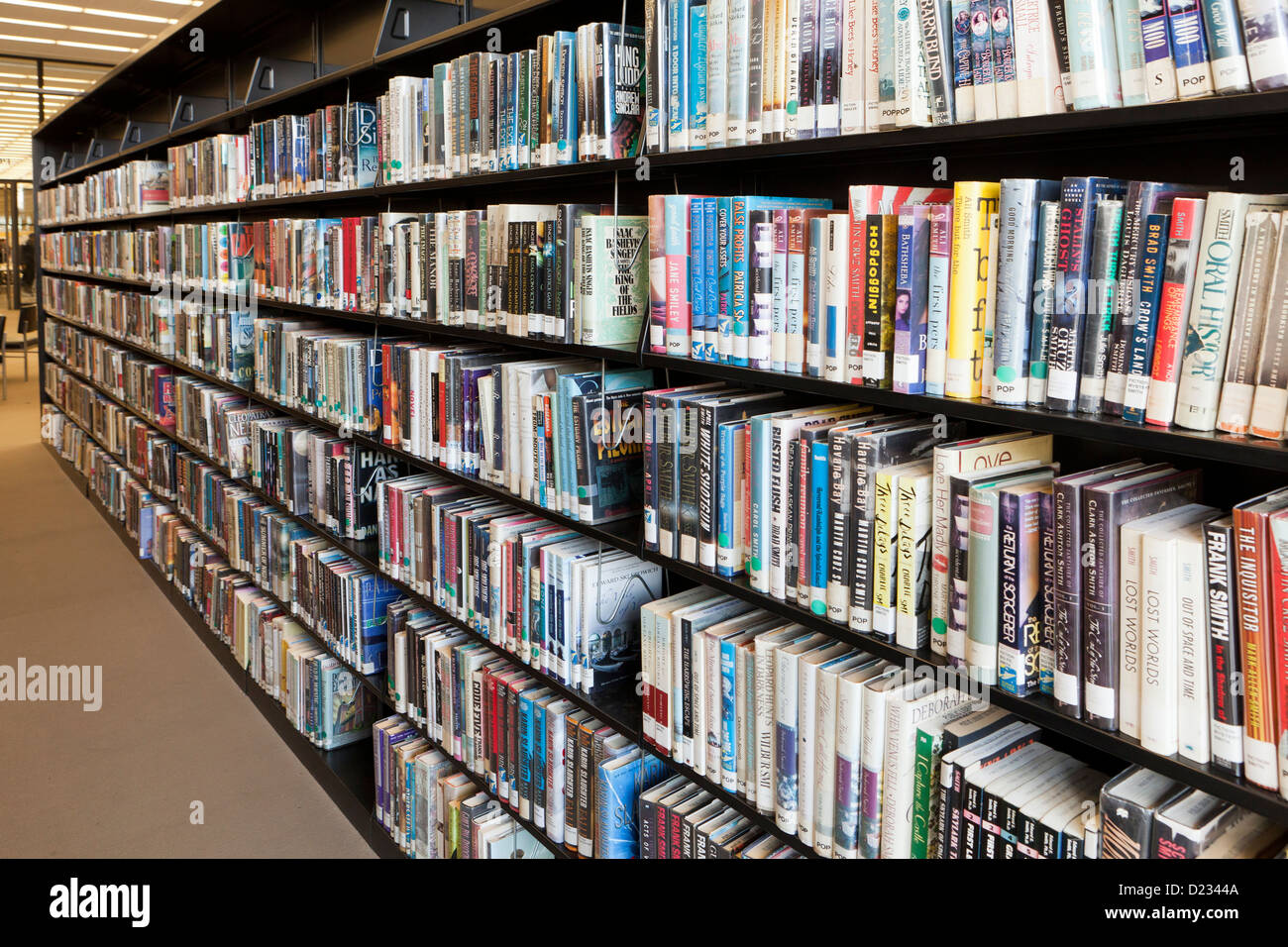 Library shelves full of books USA Stock Photo
