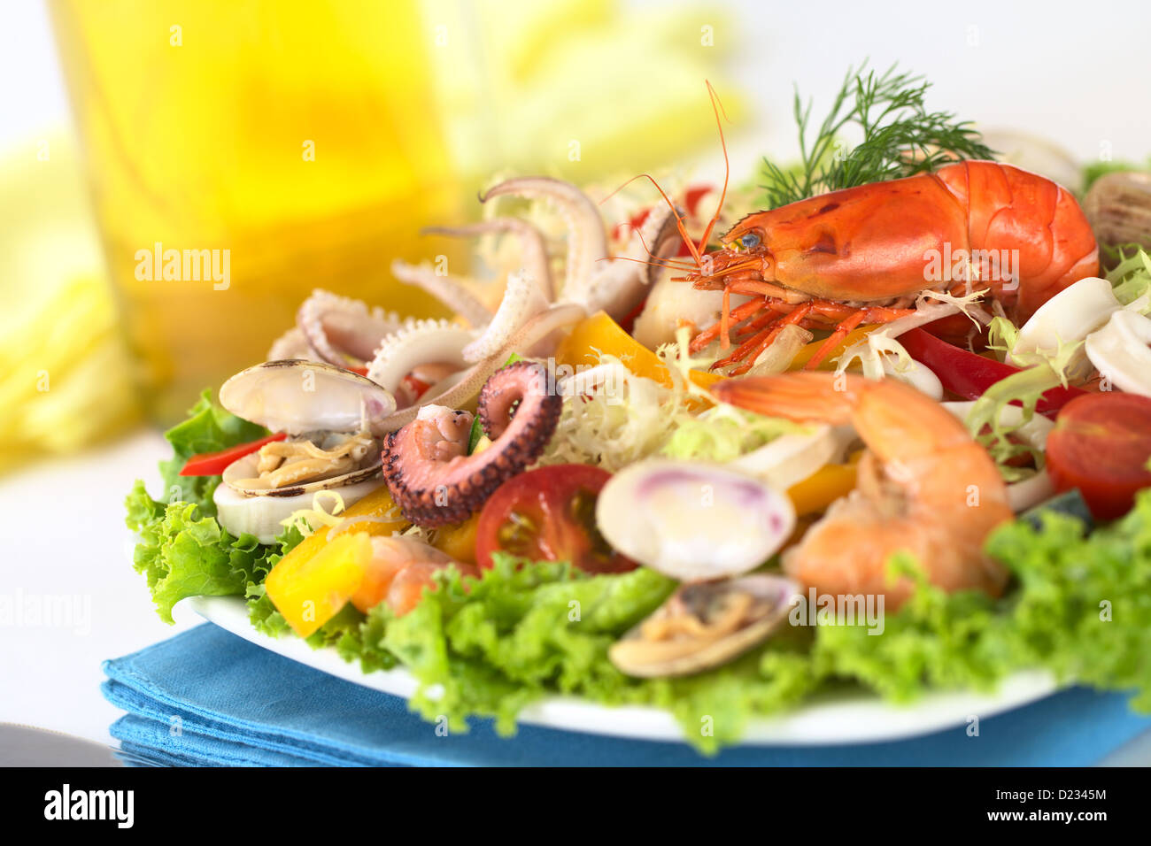 Seafood salad with shrimp, clams, octopus tentacles, calamari rings and prawns with a variety of
