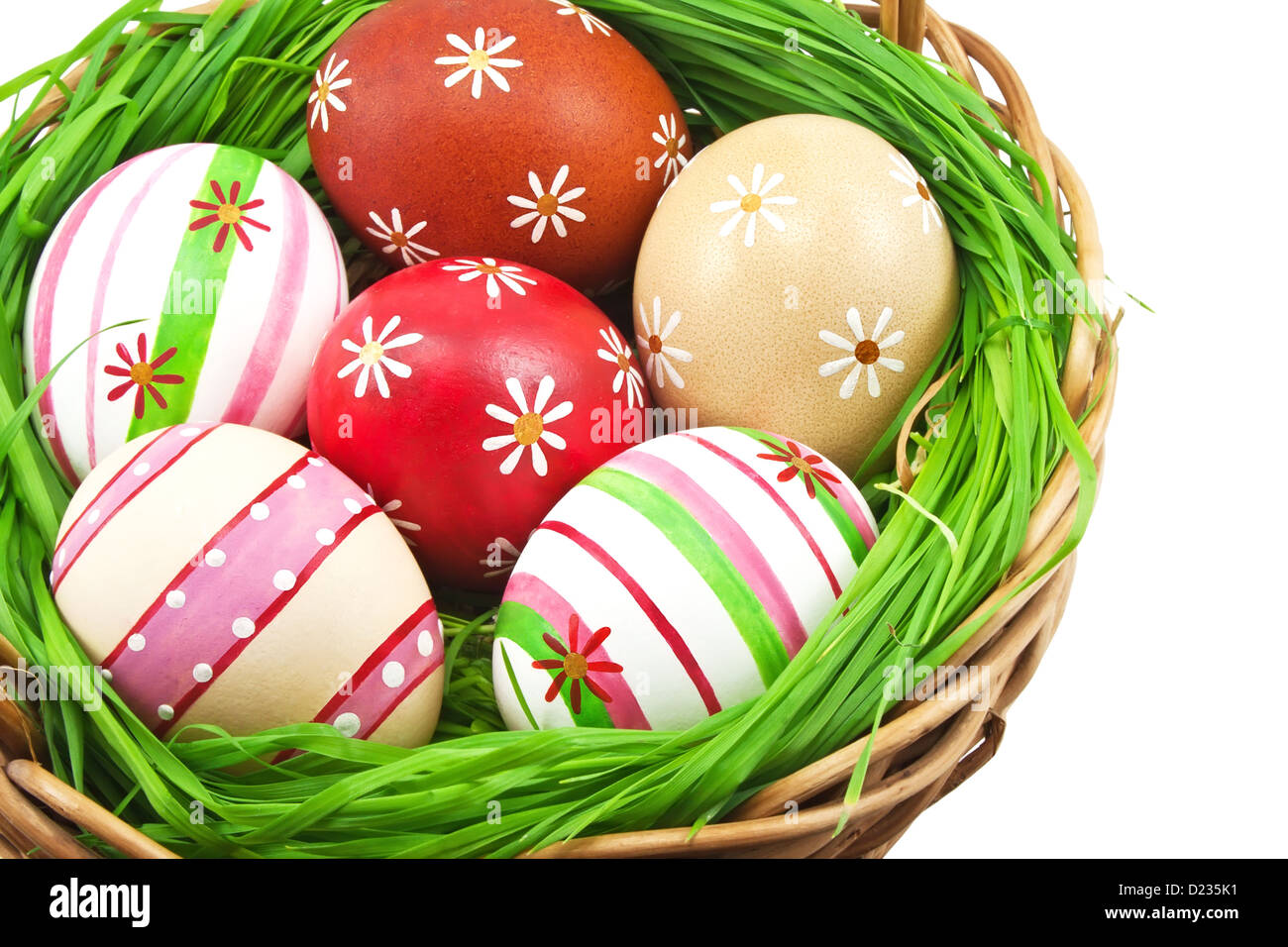 Easter eggs in the basket on white background Stock Photo - Alamy