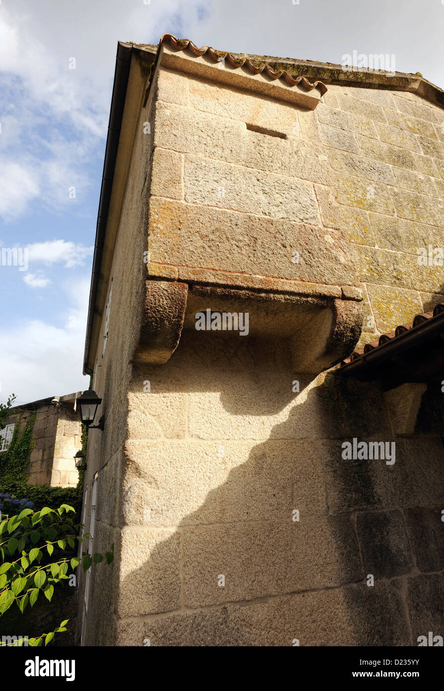 Lavatory facilities in an eighteenth century manor house, a corbelled guarderobe over the garden. Coles, Ourense, Galicia, Spain Stock Photo