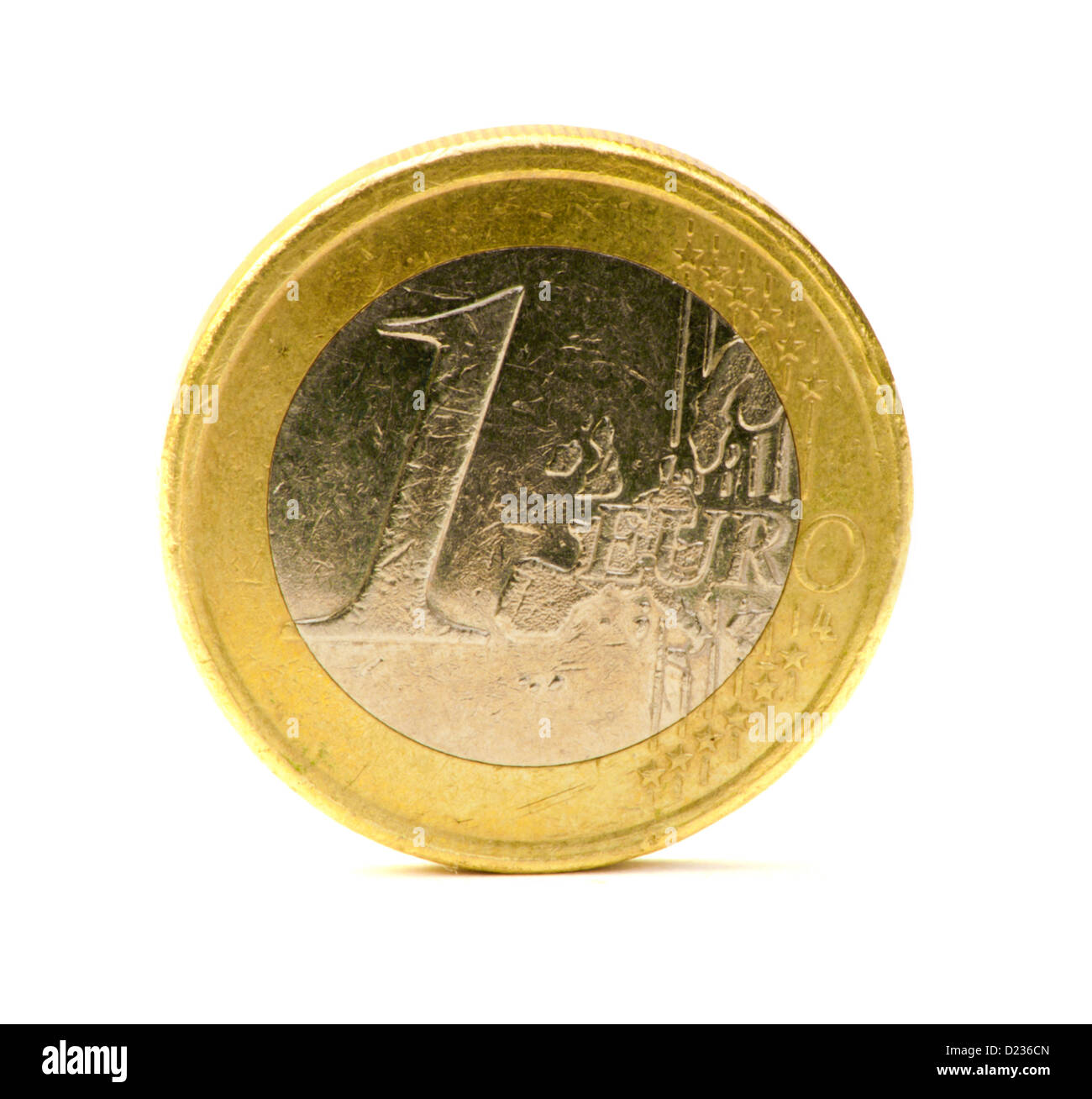 Scratched old One euro coin white isolated Stock Photo