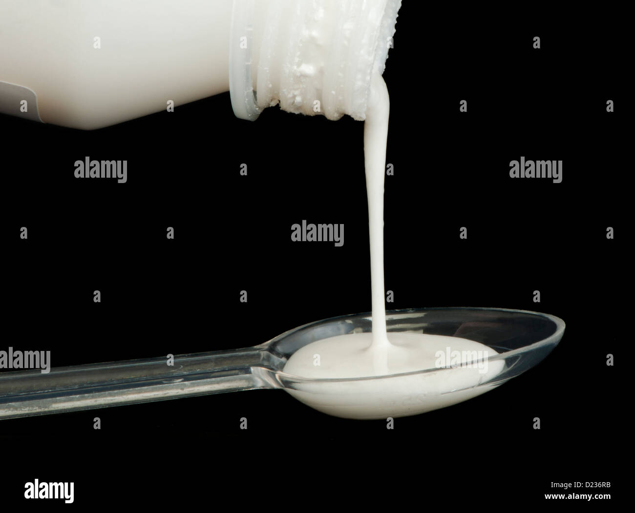 Antibiotic liquid put in a spoon Stock Photo Alamy