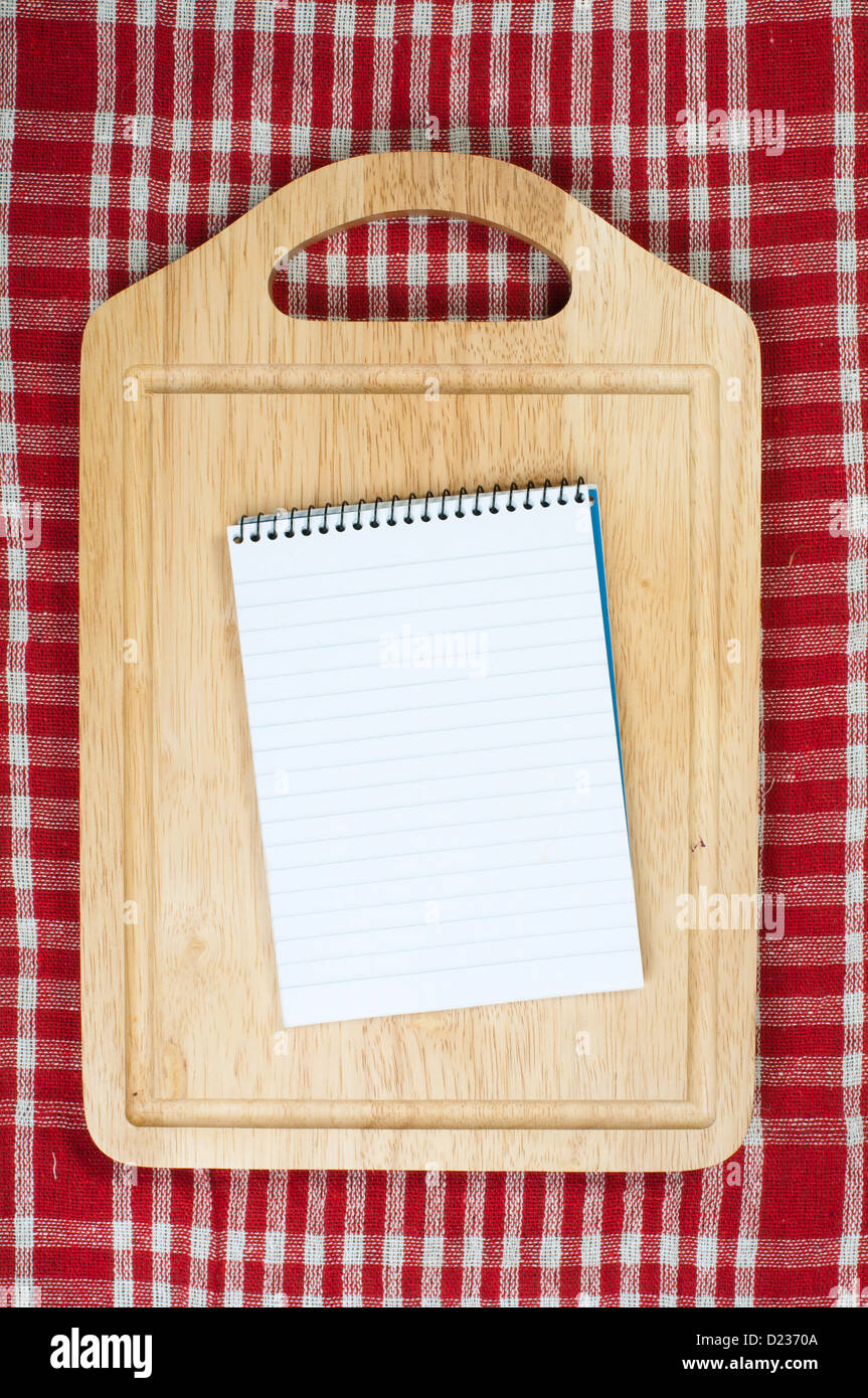 Notebook to write recipes and vegetables around it Stock Photo Alamy