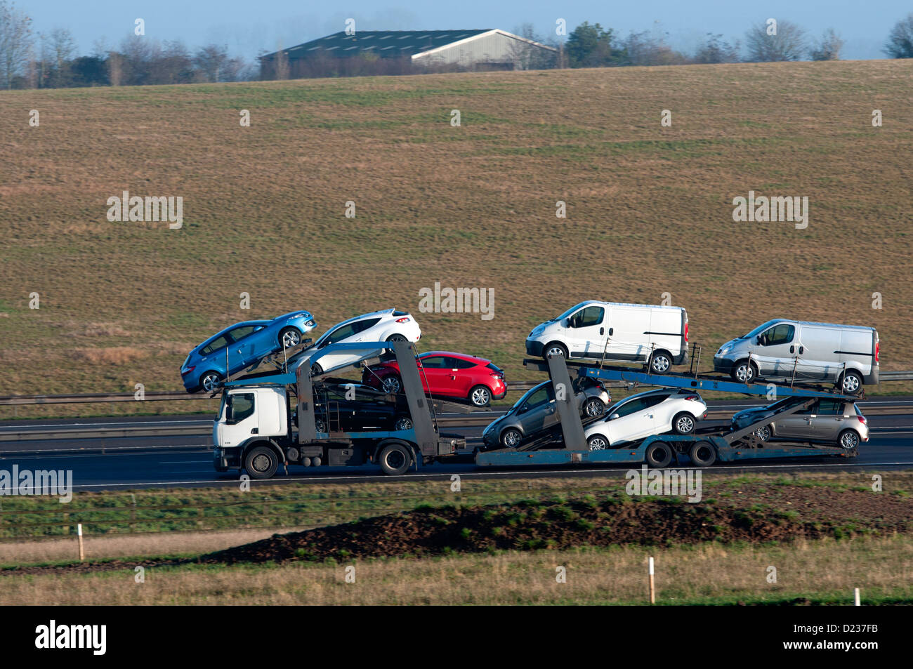 Car transporter on M40 motorway, UK Stock Photo