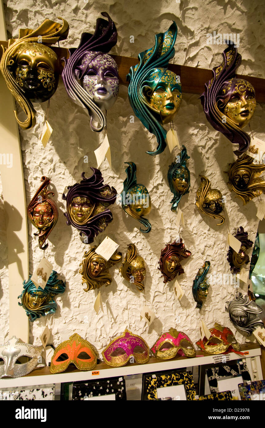 A ceiling display of Masquerade Ball Masks and Mask on sale