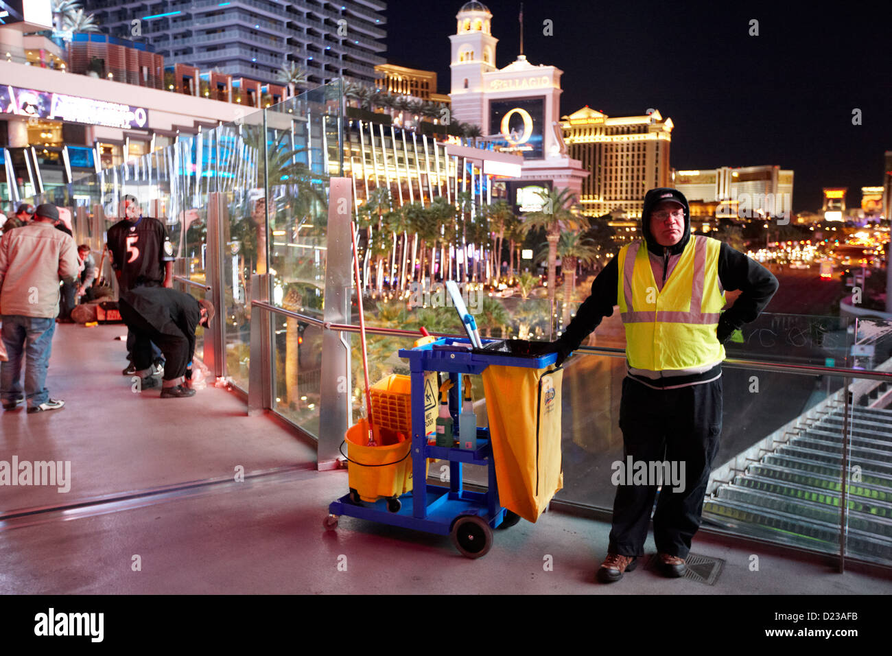 member of street cleaning team standing on overhead walkway las vegas boulevard nevada usa Stock Photo