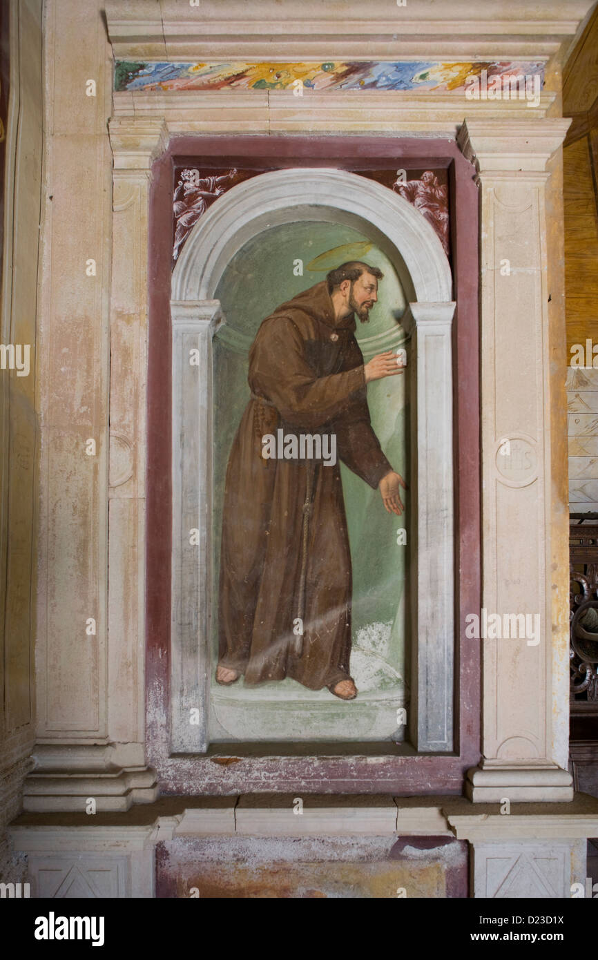 Piedmont: Sacro Monte di Francesco - St Francis depicted in a fresco in chapel X Stock Photo