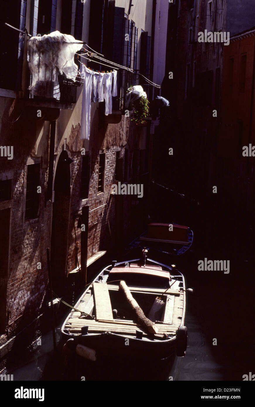 Wooden boat in canal waterway, Venice Italy Stock Photo Alamy