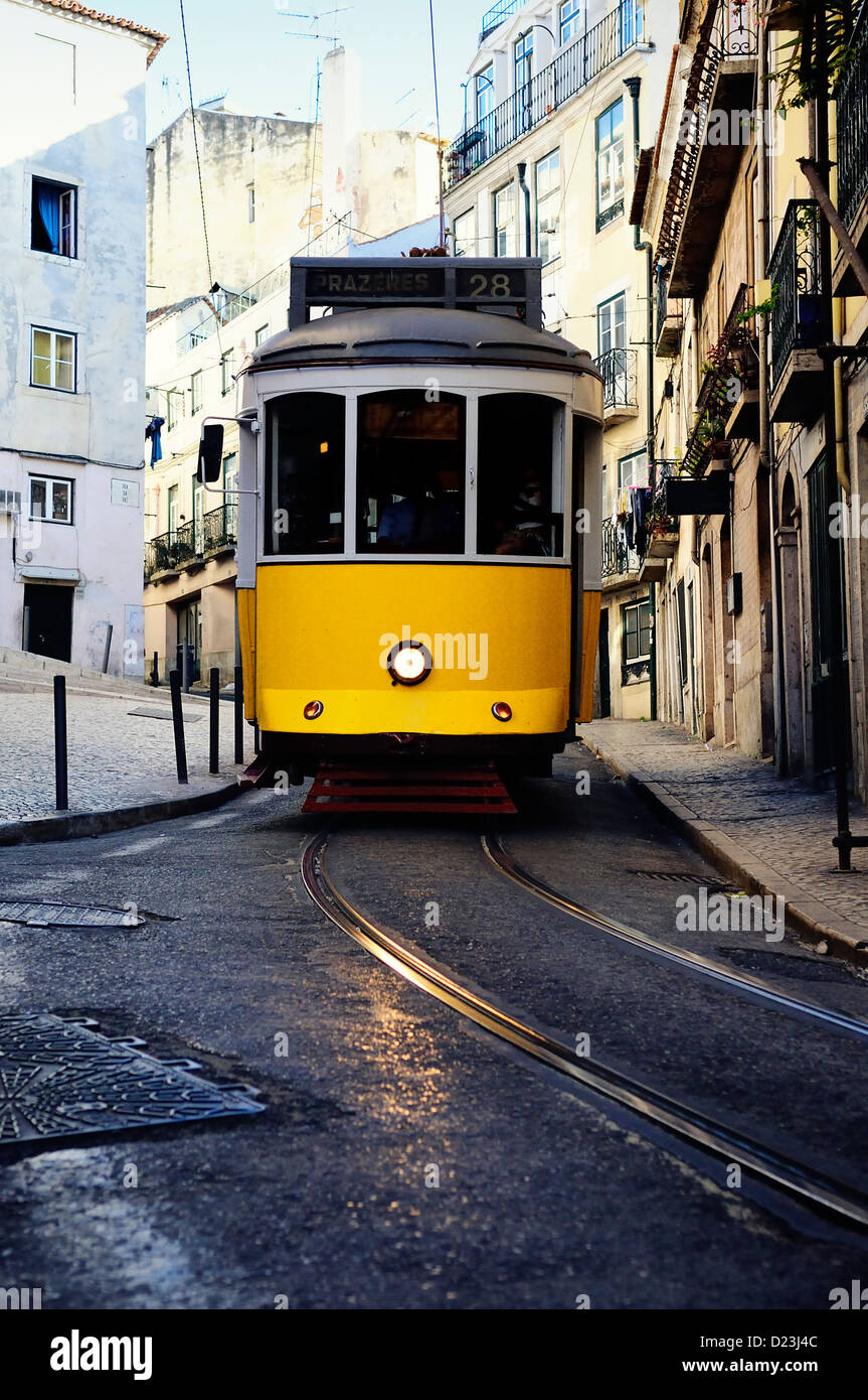 Vintage Trams such as these two are a common site in the Portuguese Capital of Lisbon - Portugal Stock Photo
