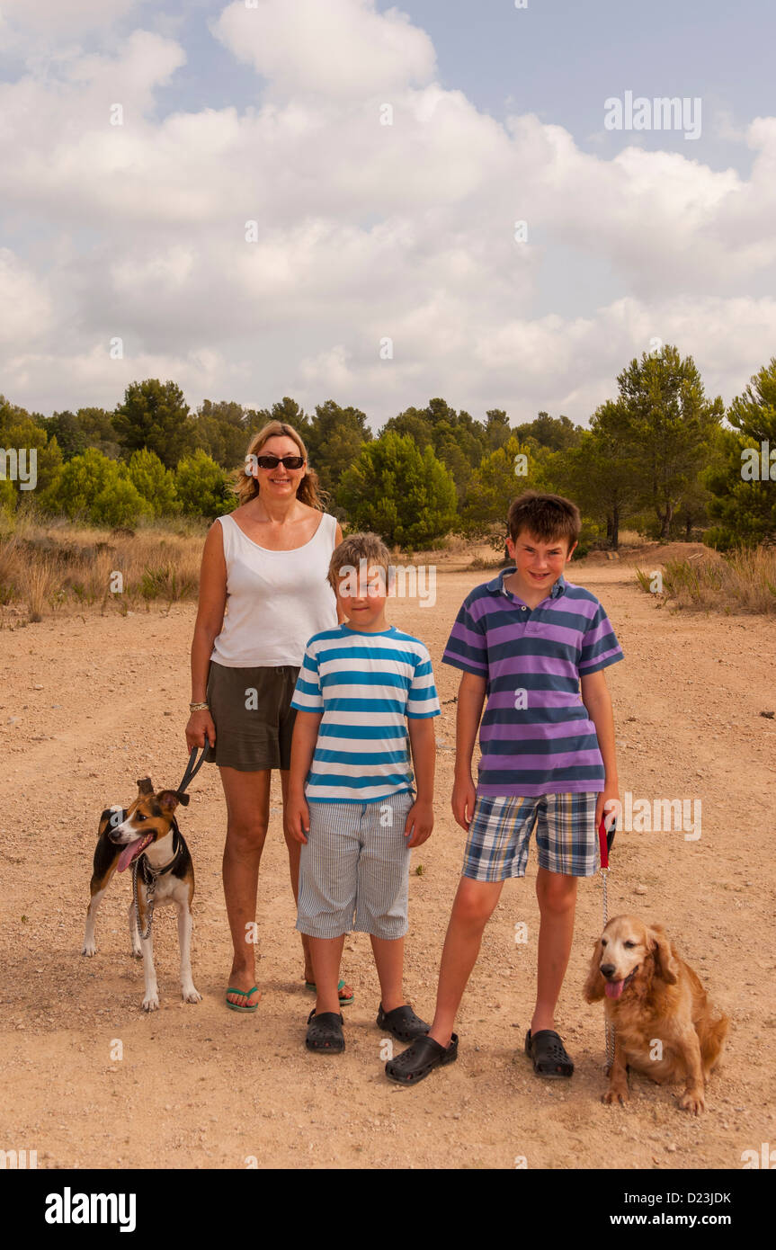 A family walking the dog in Spain Stock Photo
