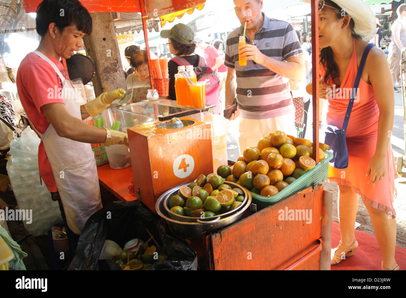 Orange juice shop at Chatuchak Weekend Market in Bangkok , Thailand