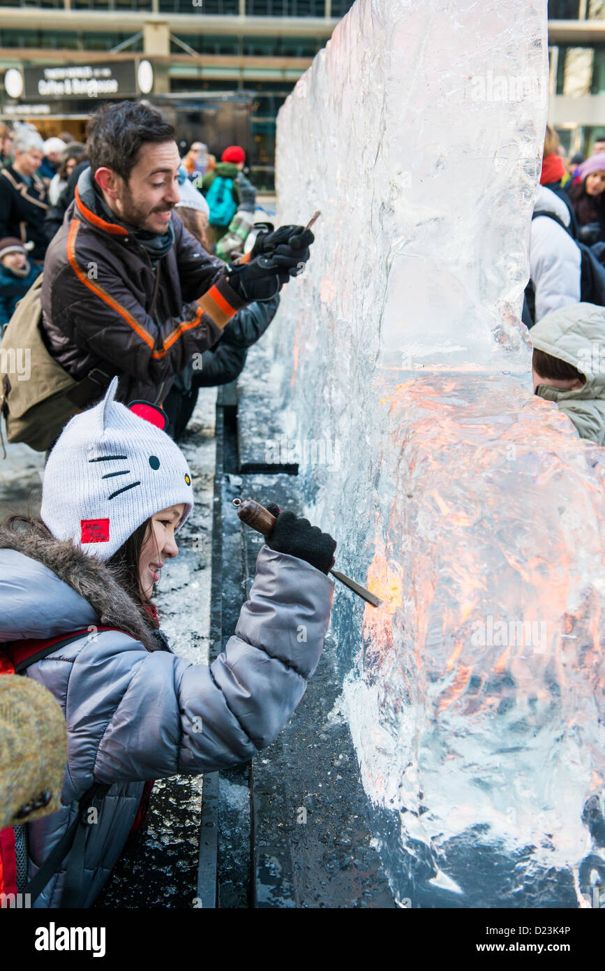 Public activity at the London Ice Sculpture Festival, in Canary Wharf ...