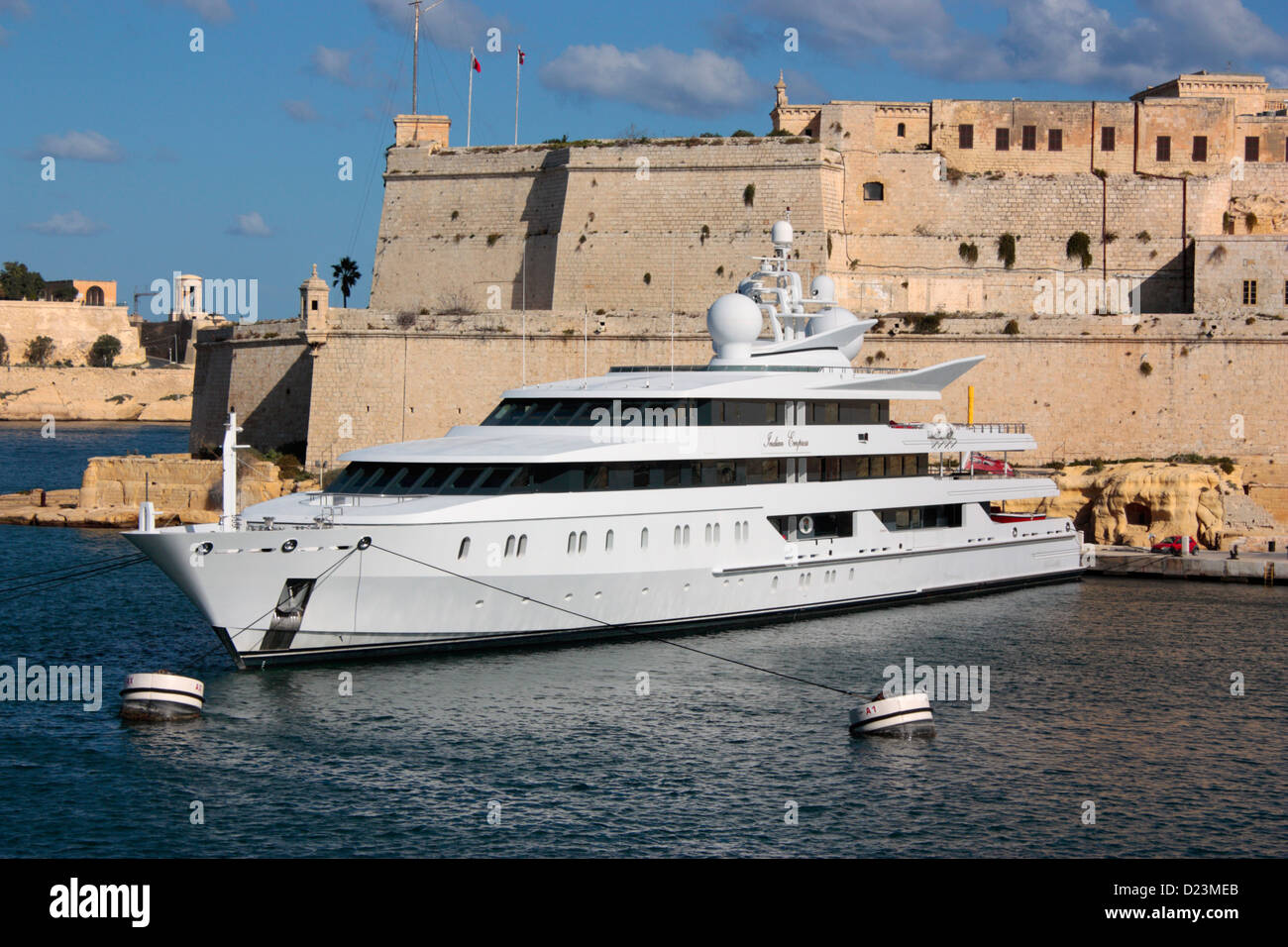 The 95m Oceanco superyacht Indian Empress moored beneath Fort St Angelo in Malta Stock Photo