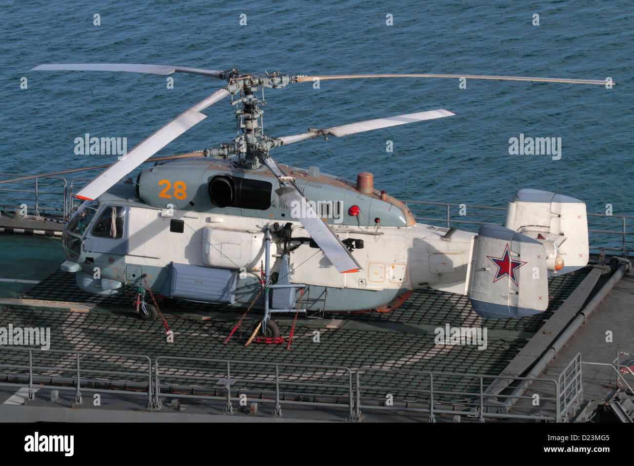 Kamov Ka-27 helicopter of the Russian Navy with unusual contra-rotating rotor mechanism on the rear deck of the frigate Yaroslav Mudry Stock Photo