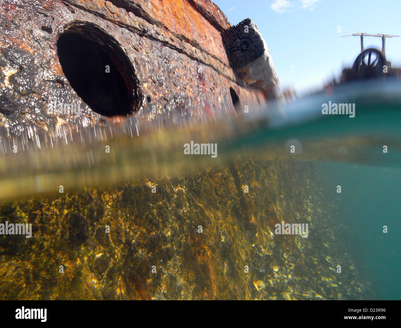 Porthole in rusting hull, Tangalooma Wrecks, Moreton Island, Moreton Bay Marine Park, Queensland, Australia Stock Photo