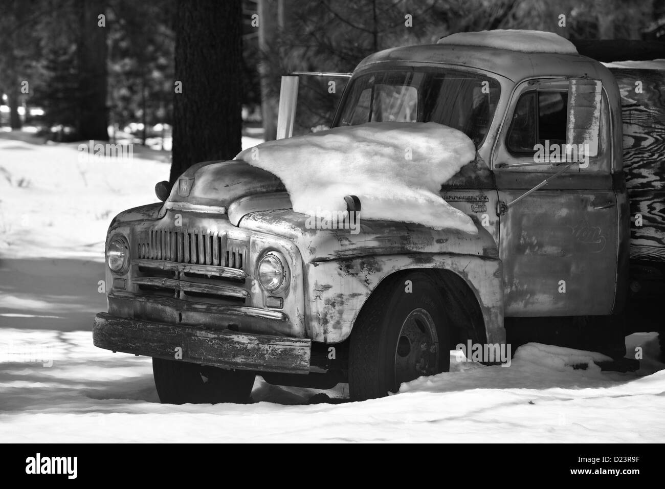Black and white of old truck in snow Stock Photo