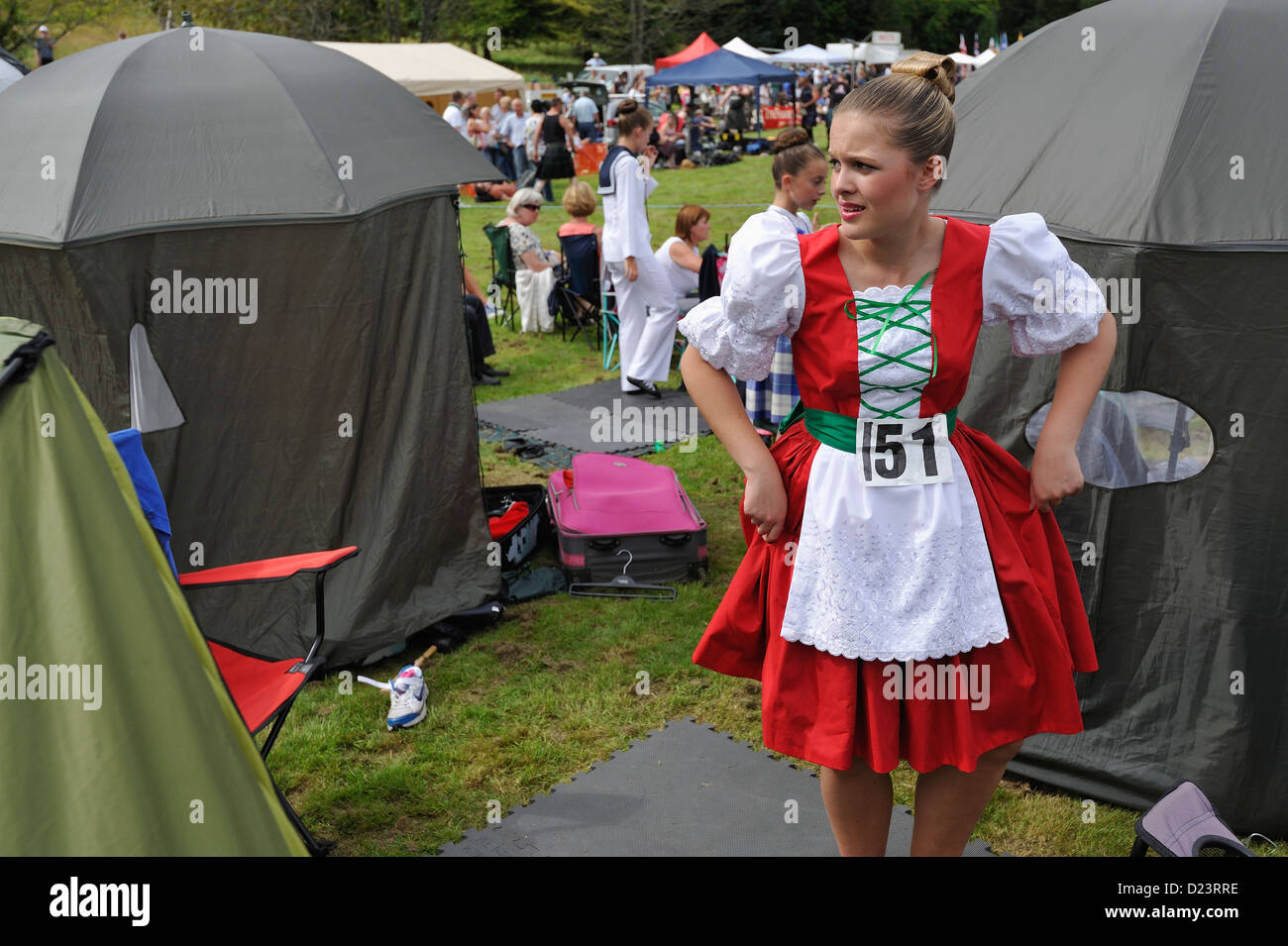A dancer waits her turn to enter the competition at the Killin Highland Games Stock Photo