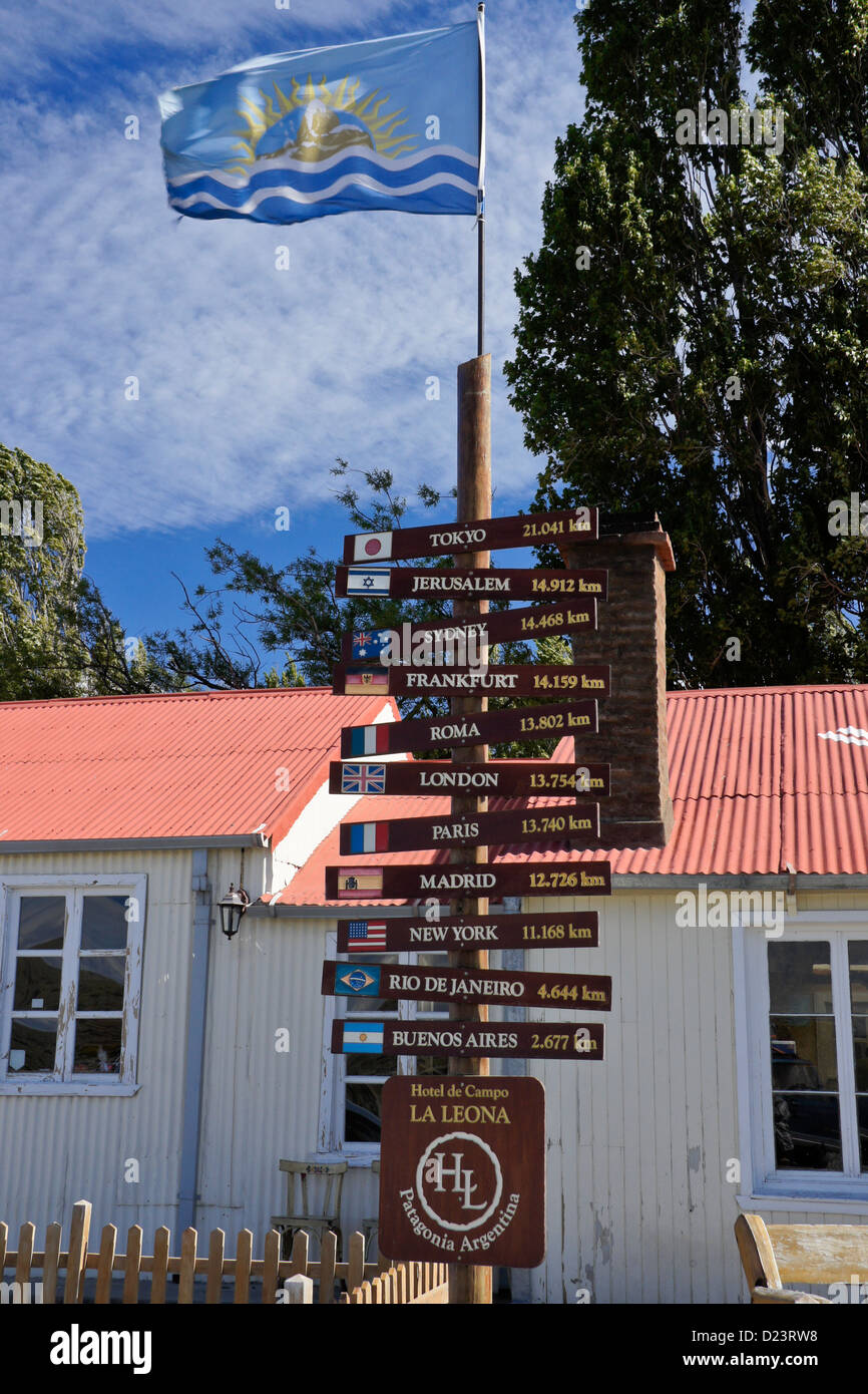 Distance marker in front of La Leona roadhouse, Patagonia, Argentina Stock Photo