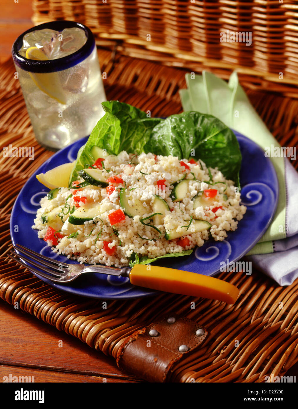 A bowl of couscous with a drink Stock Photo Alamy
