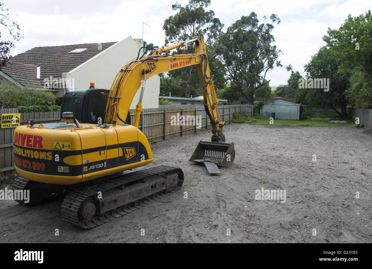 Demolition of a 1920s timber dwelling in suburban Melbourne has created a level, vacant site for a new home Stock Photo