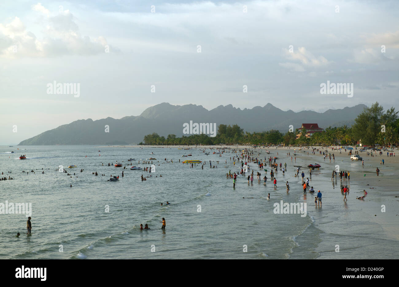 View of tourists and locals at Cenang Beach at Langkawi Island, Malaysia, 13 November 2012. Photo: Soeren Stache Stock Photo