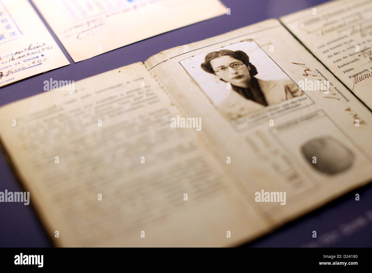 An old passport of Dora Schindel, who is Jewish and escaped from the Nazis in Germany to find refuge in Switzerland in 1937 and later in Brazil, lies on a table during a press date for the exhibition 'I am a Stranger to those People there' (Fremd bin ich den Menschen dort) at Buddenbrookhaus in Luebeck, Germany, 11 January 2013. The exhibition shows 16 biographies of mostly unknown persons from the collection of the German Exile Archive from 1933 till 1945. The exhibition will be opened with a soiree on 11 January 2013. Photo: MALTE CHRISTIANS Stock Photo