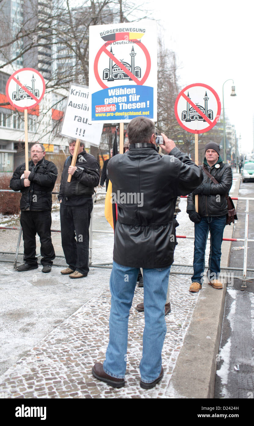 'Pro Deutschland' members attend a counter-rally against salafists in Berlin, Germany, 13 January 2013. After the salafists were not allowed to meet in Kreuzberg they rented a room in Neukoelln. At the convention, several salafist leaders are to speak. At the same time, the nationalist and anti-islamic party 'Pro Deutschland' ('Pro Germany') held a counter-demonstration with approximately 15 participants. Photo: Florian Schuh Stock Photo