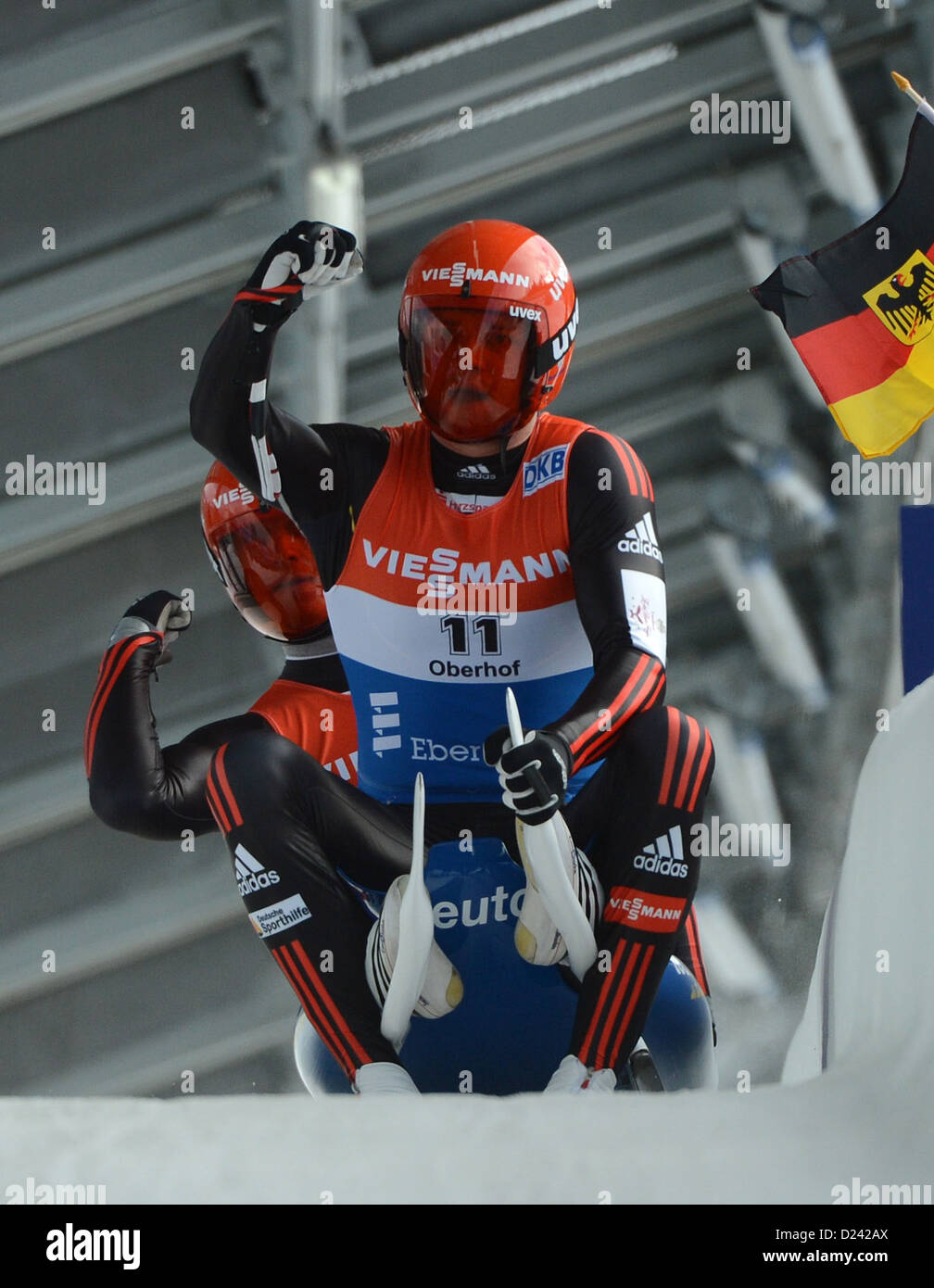 German lugers Toni Eggert and Sascha Benecken celebrate after their run 