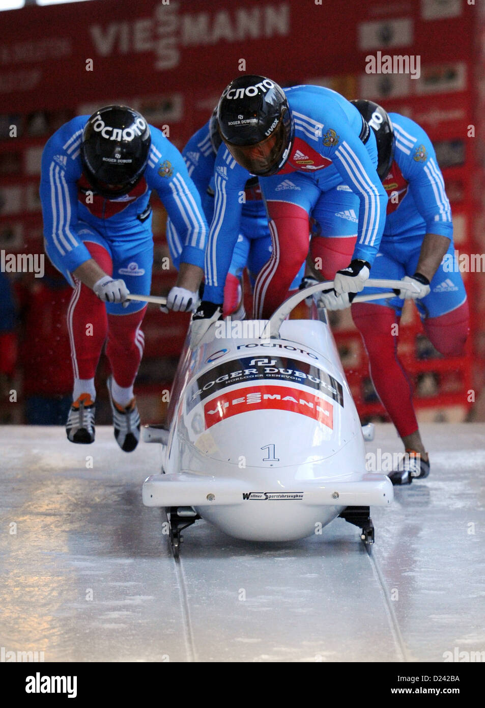 Russian bobsled racers Alexandr Zubkov (FRONT), Alexey Negodaylo ...