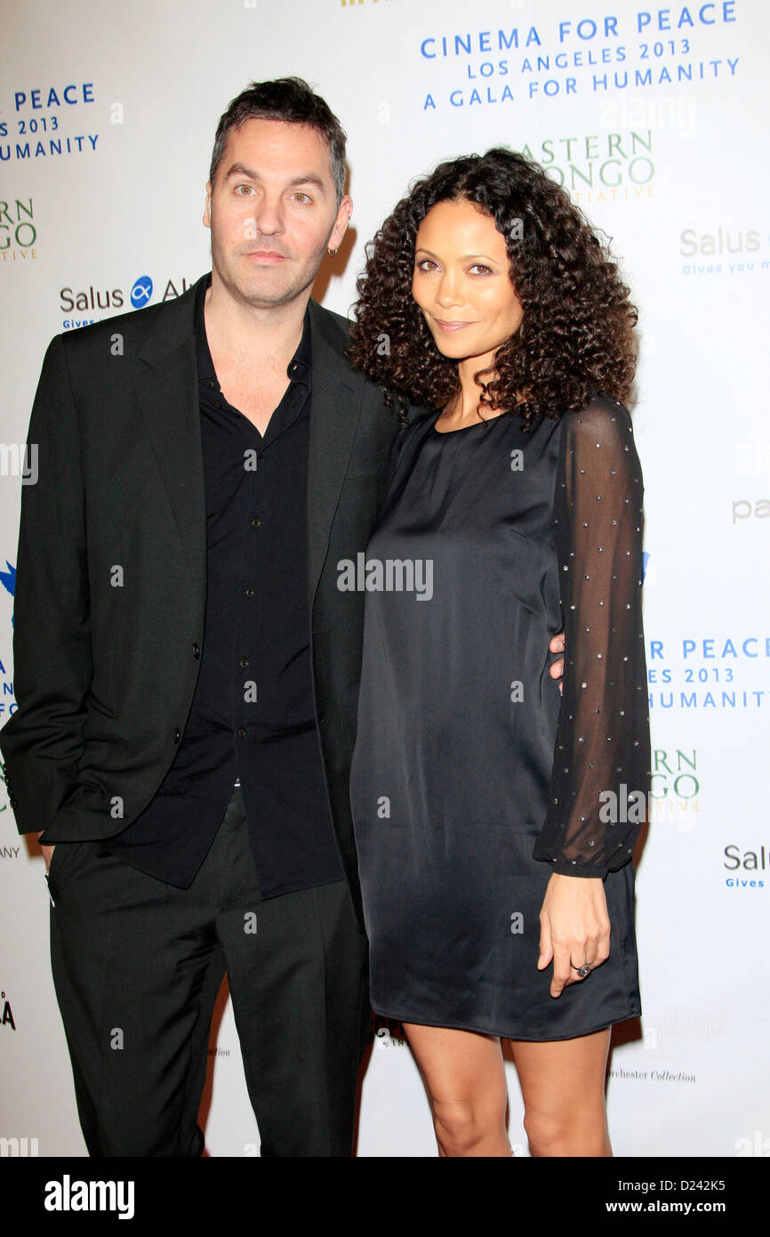 Ol Parker and Thandie Newton attend the Cinema For Peace Foundation's 2013 Gala For Humanity at Beverly Hills Hotel on January 11, 2013 in Beverly Hills, California. Stock Photo