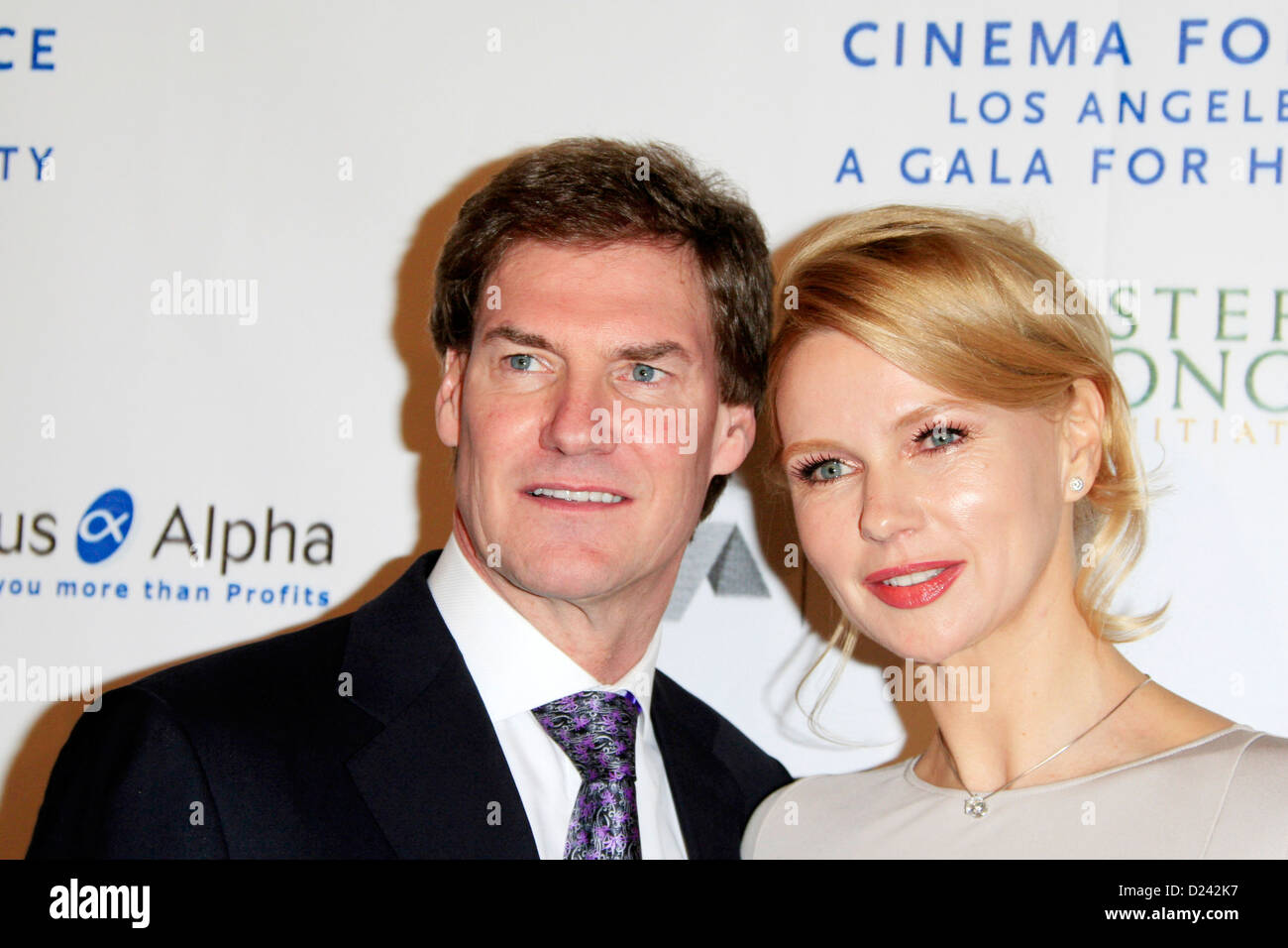 Veronica Ferres and Carsten Maschmeyer attend the Cinema For Peace Foundation's 2013 Gala For Humanity at Beverly Hills Hotel on January 11, 2013 in Beverly Hills, California. Stock Photo