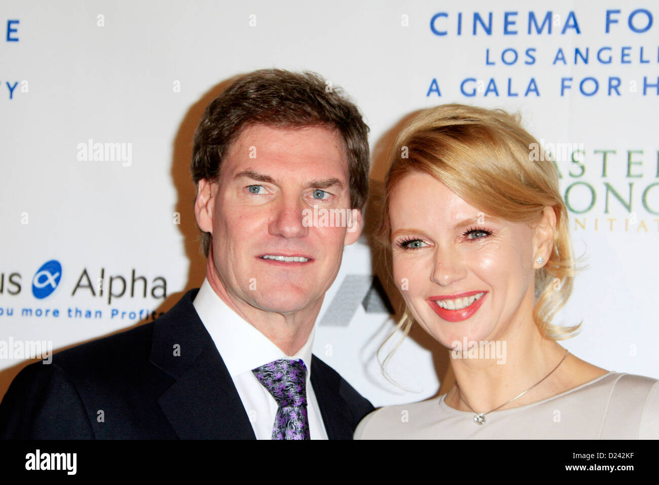 Veronica Ferres and Carsten Maschmeyer attend the Cinema For Peace Foundation's 2013 Gala For Humanity at Beverly Hills Hotel on January 11, 2013 in Beverly Hills, California. Stock Photo