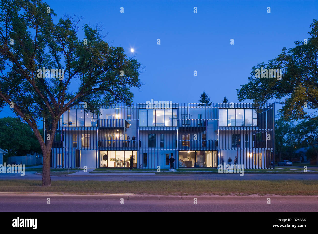 Bloc 10, Winnipeg, Canada. Architect: 5468796 Architecture, 2012. Exterior view at dusk. Stock Photo
