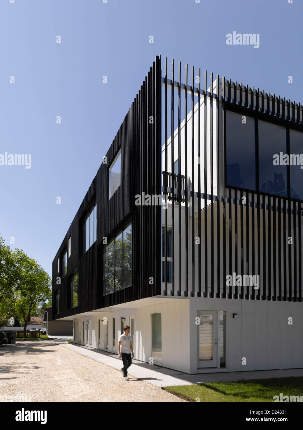 Bloc 10, Winnipeg, Canada. Architect: 5468796 Architecture, 2012. Corner view showing qualities of timber cladded facade. Stock Photo