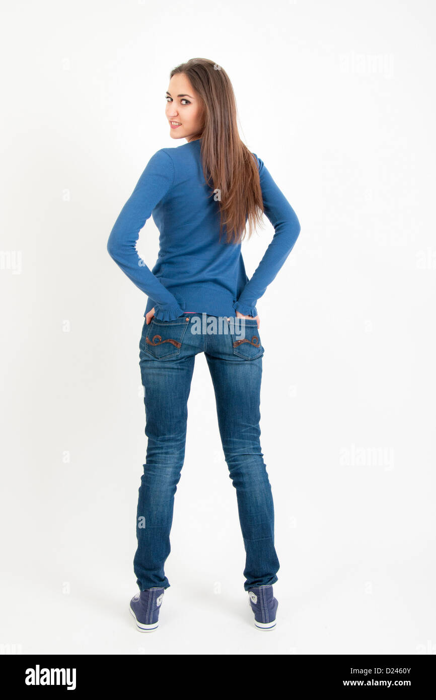Woman wearing jeans with hands in pockets Stock Photo - Alamy