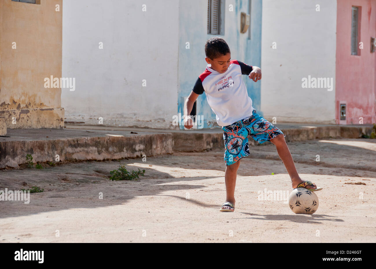 Brazilian boy playing soccer Stock Photo Alamy