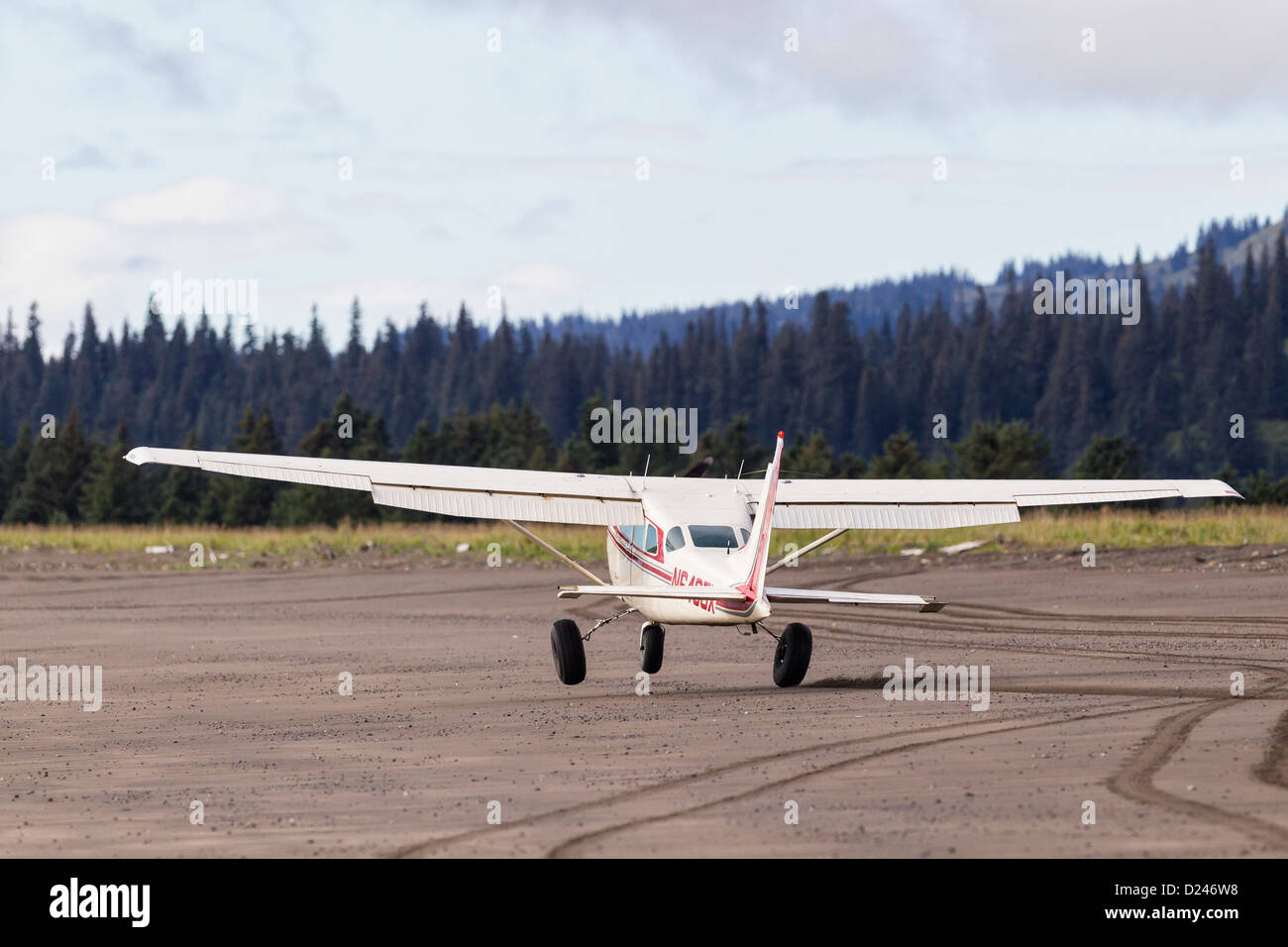 USA, Alaska, Plane landing on beach Stock Photo