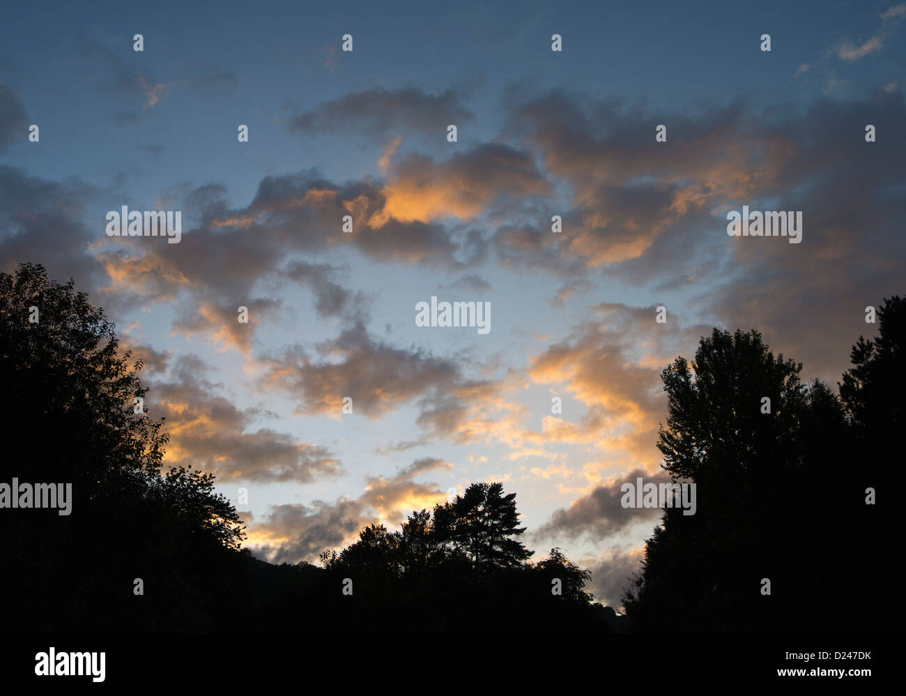 Sunset sky with brightly-coloured clouds Stock Photo - Alamy