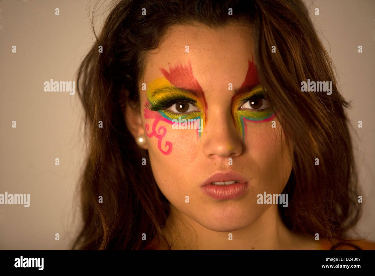 A model poses during a body painting session with makeup artist Erika Monroy, founder of Akin