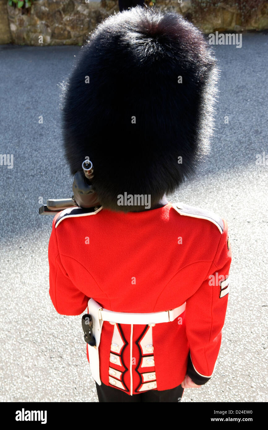 A British Guards soldier in formal dress at a military funeral in Croydon. Stock Photo